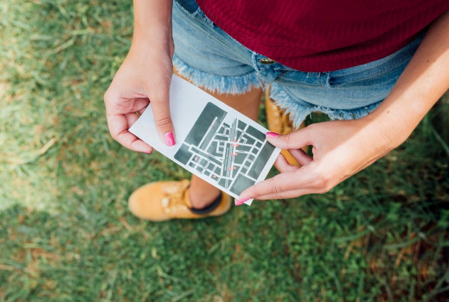 woman holding zoning map